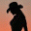 Cowgirl Silhouette in the Sunset